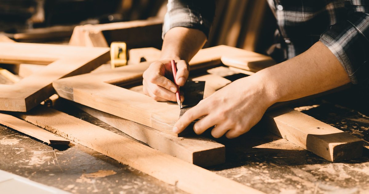Hands at work on a carpentry project